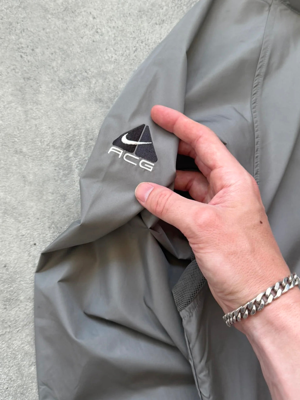 nike acg 1990s packable shell jacket, mesh ventilation panel detail