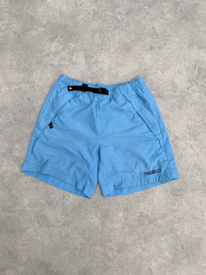 nike acg 1990s technical cargo shorts in sky blue, front view