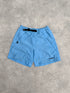 nike acg 1990s technical cargo shorts in sky blue, front view