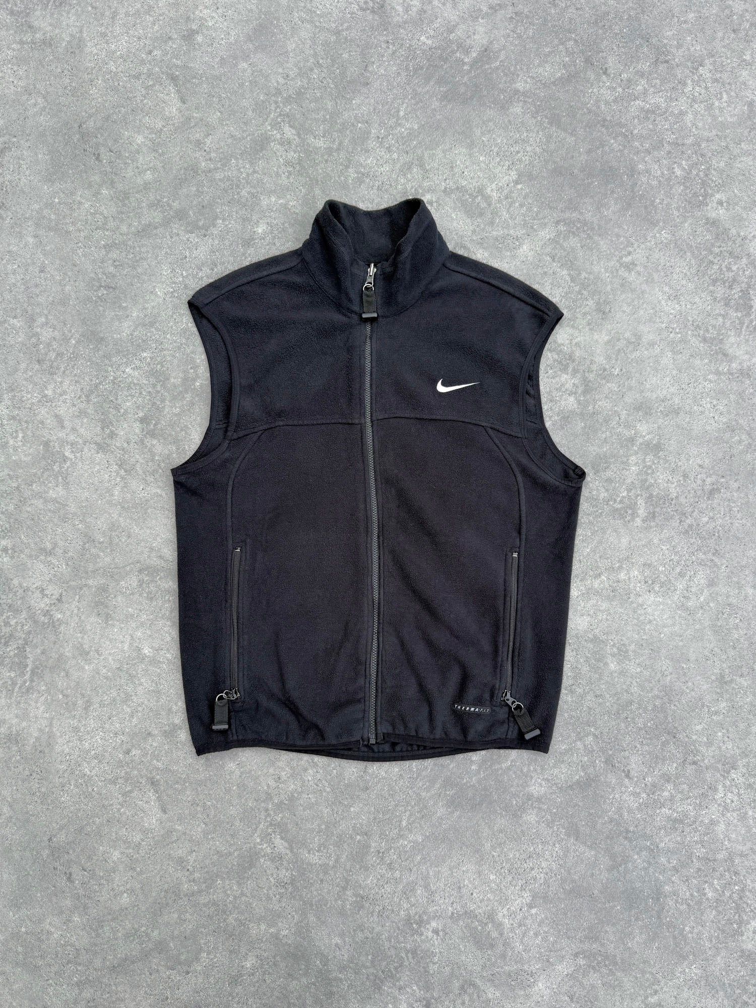 nike acg 1990s technical fleece vest jacket in black orange, front view