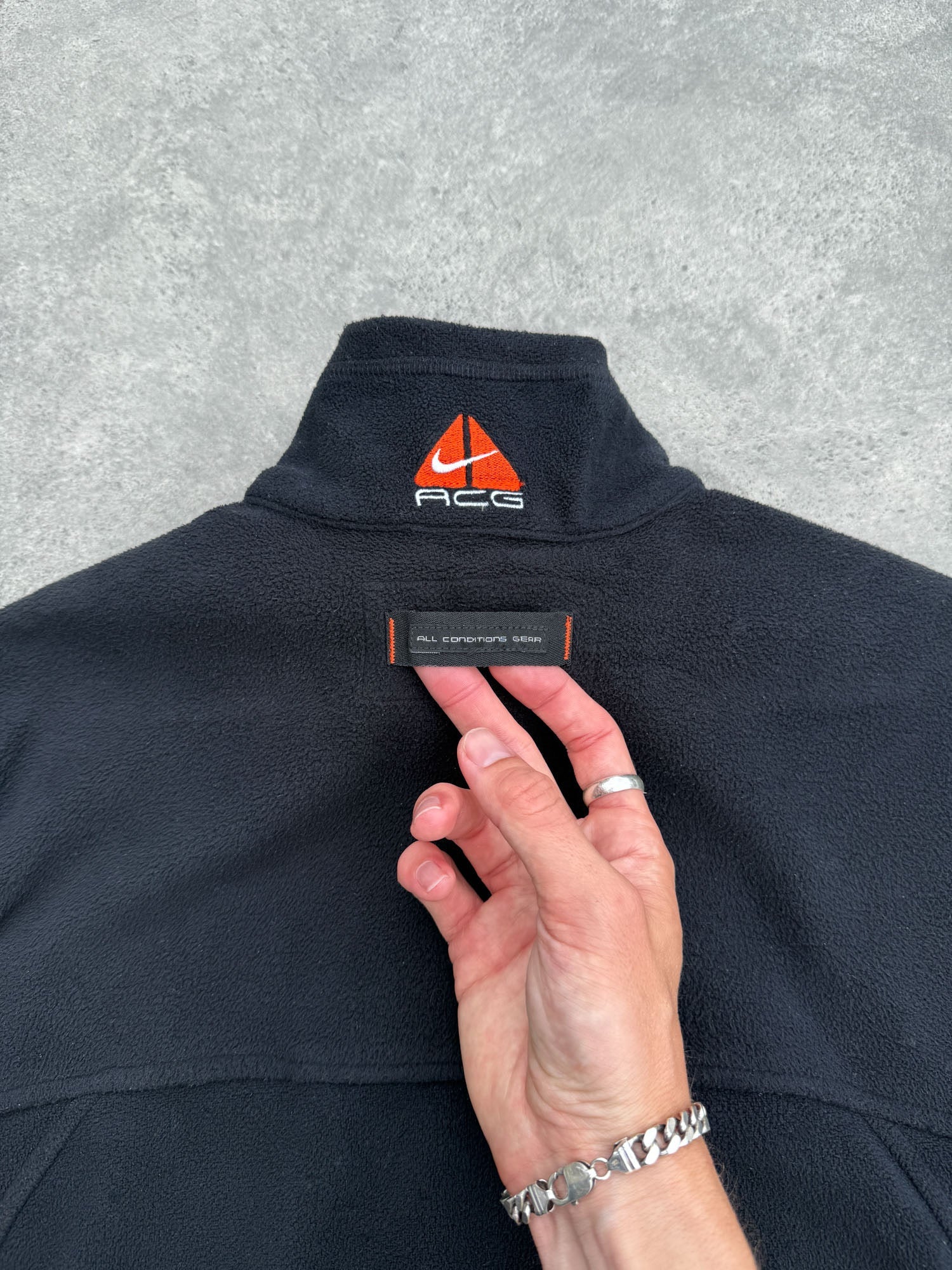 nike acg 1990s technical fleece vest jacket, orange neck loop detail
