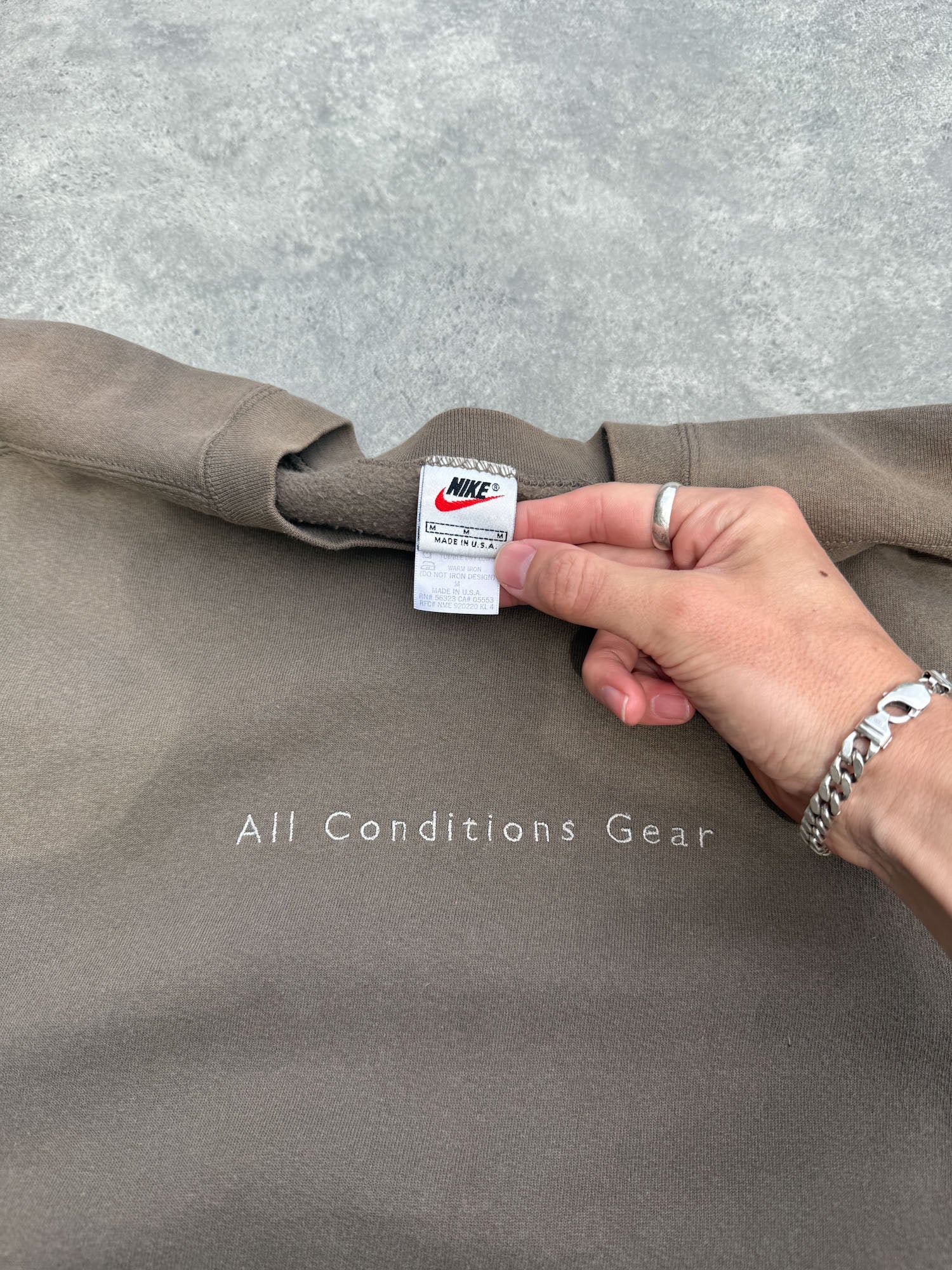 nike acg 1990s heavyweight embroidered spellout sweatshirt in washed brown, back view