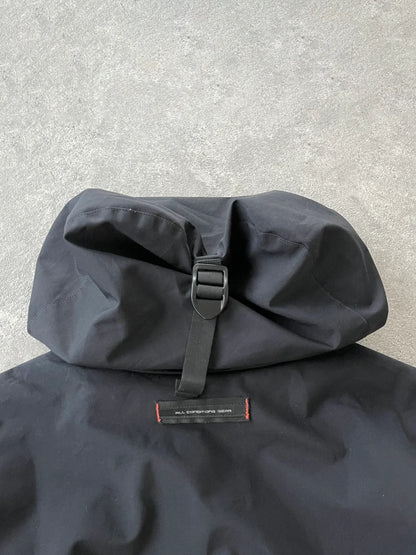 nike acg 1990s lightweight technical ripstop waterproof jacket in black, back view