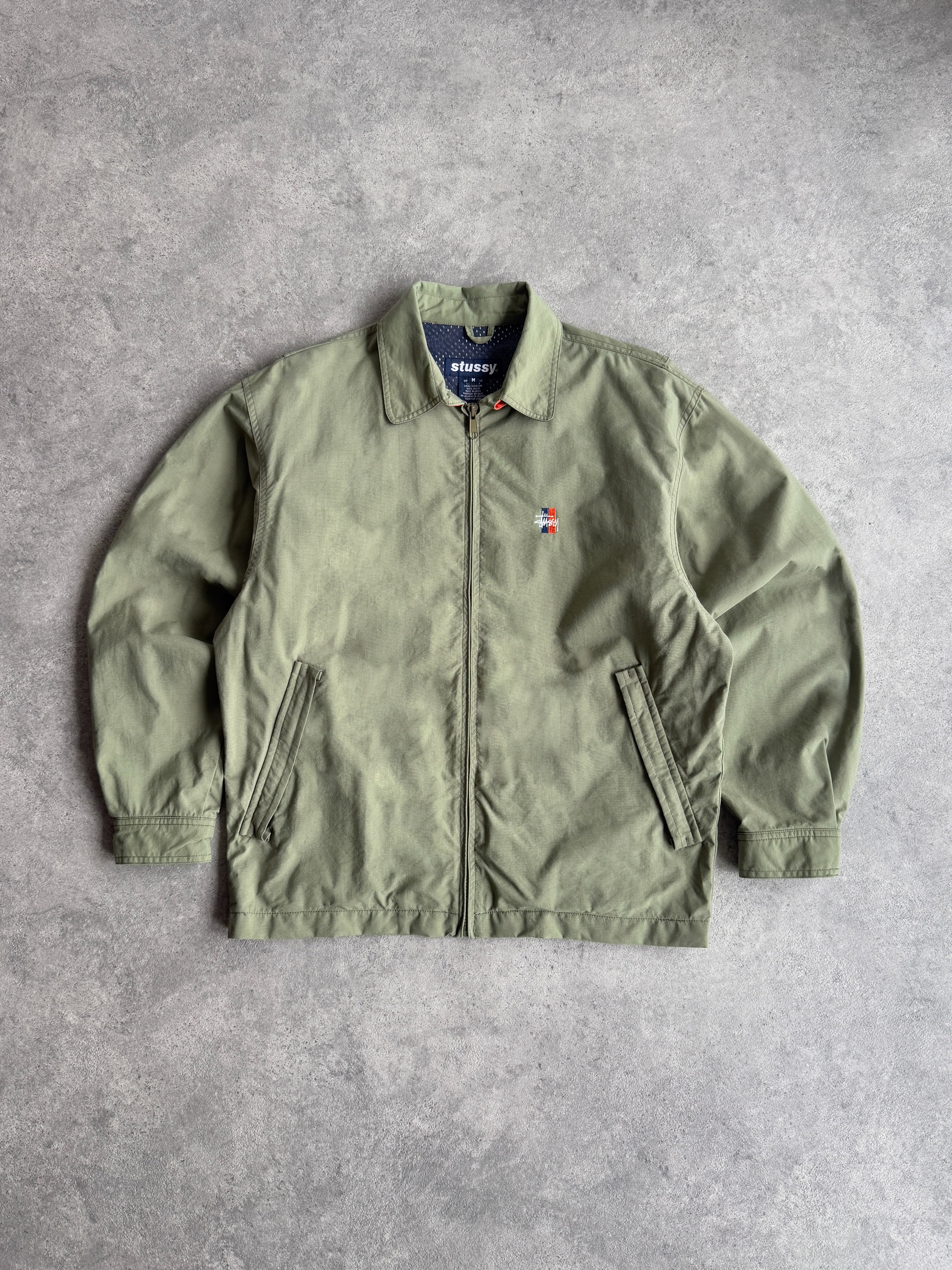 stussy 1990s lightweight nylon harrington jacket in olive, front view