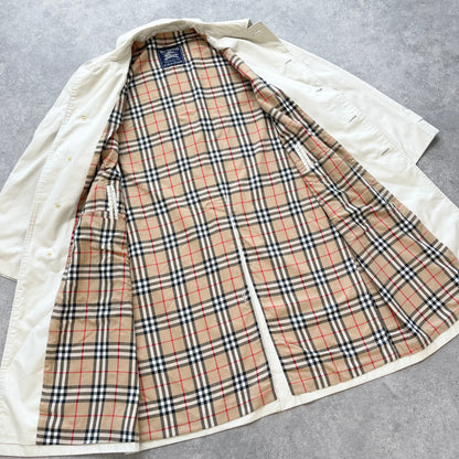 Burberry’s 1990s nova check cream trench jacket (L)